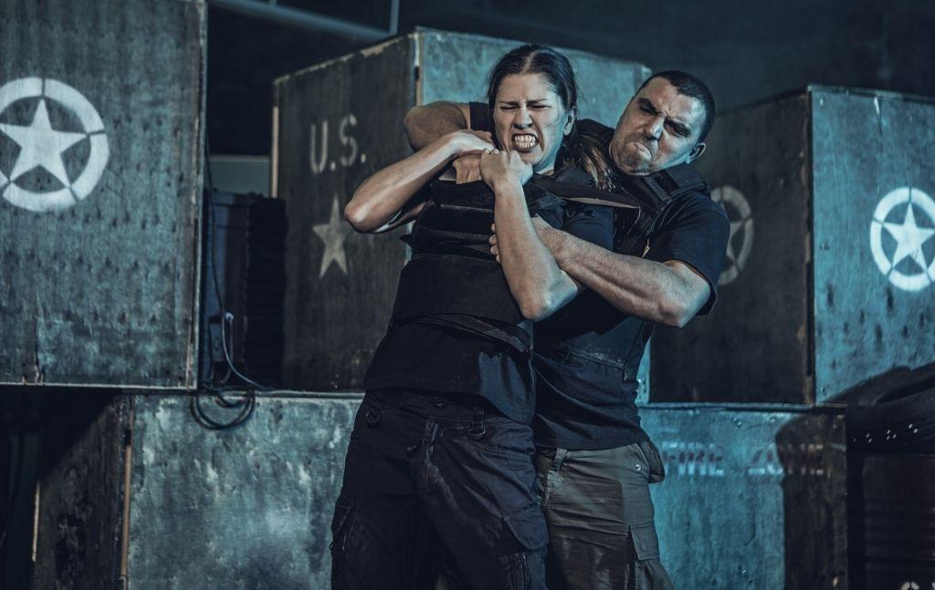 Two Krav Maga practitioners demonstrating a defensive hold