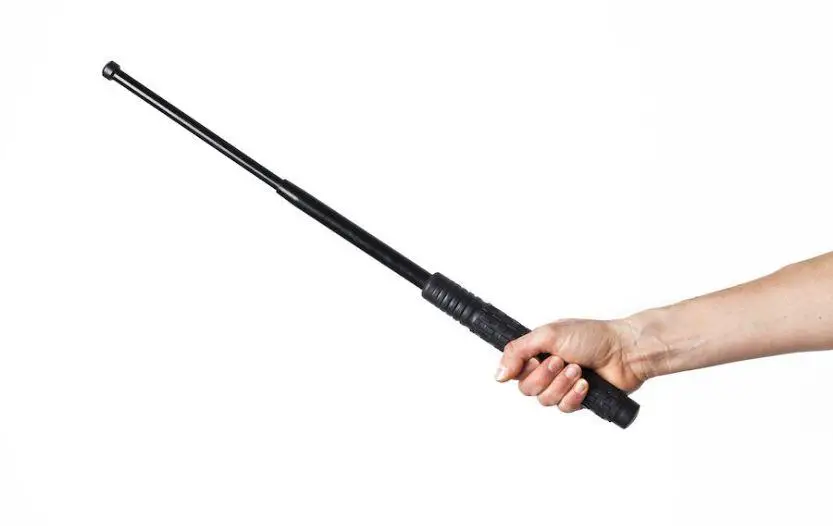 Expandable baton guide