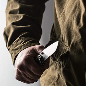 Folding knife held safely
