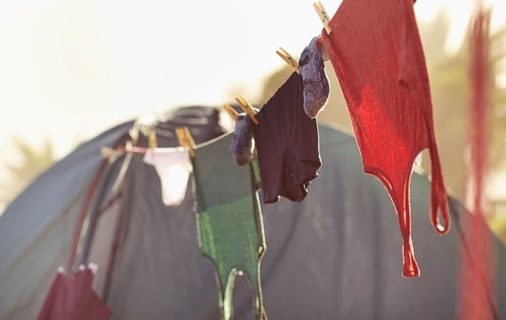 Lightweight clothing drying on a line at a campsite