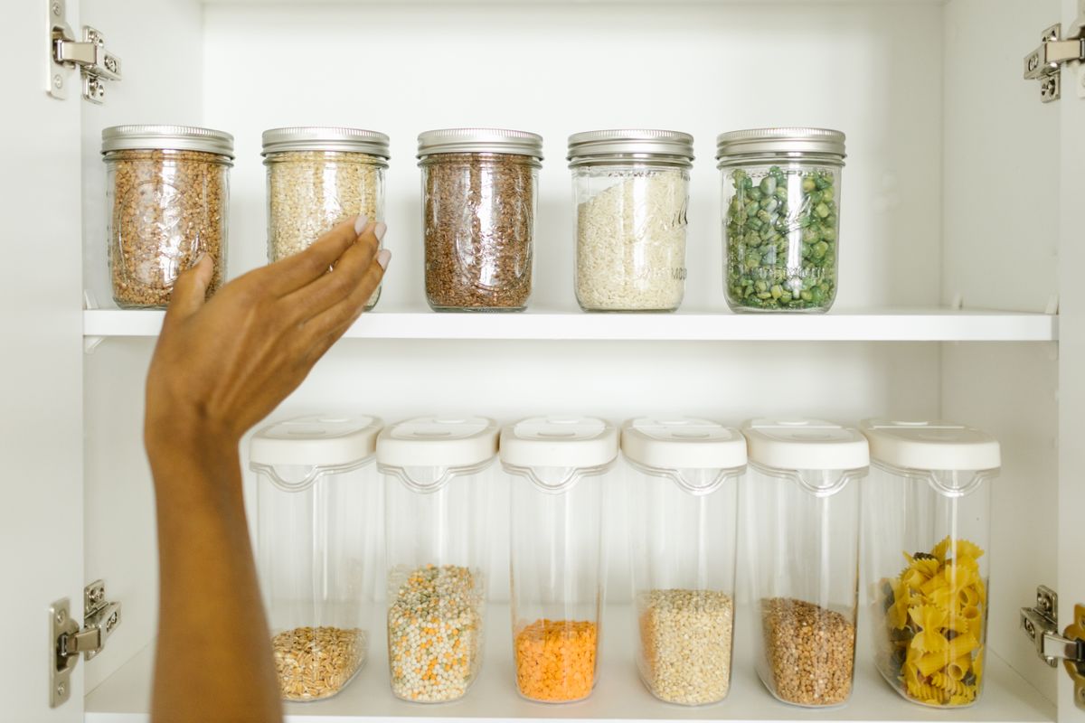 Prepared pantry with dry foods stored in jars
