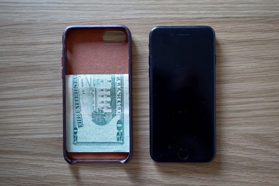 Emergency cash stored behind a phone case