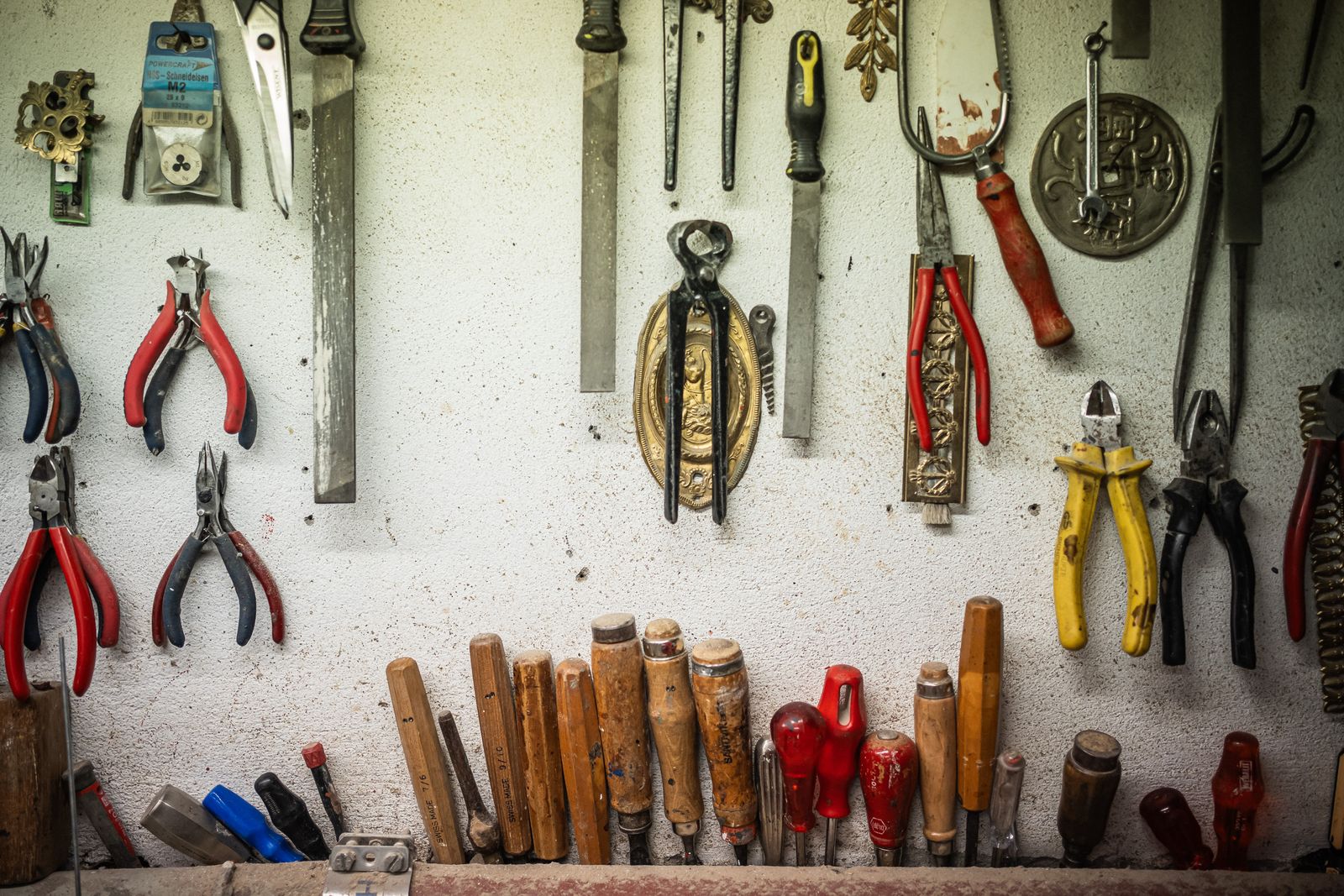 Organised hand tools in a traditional workshop