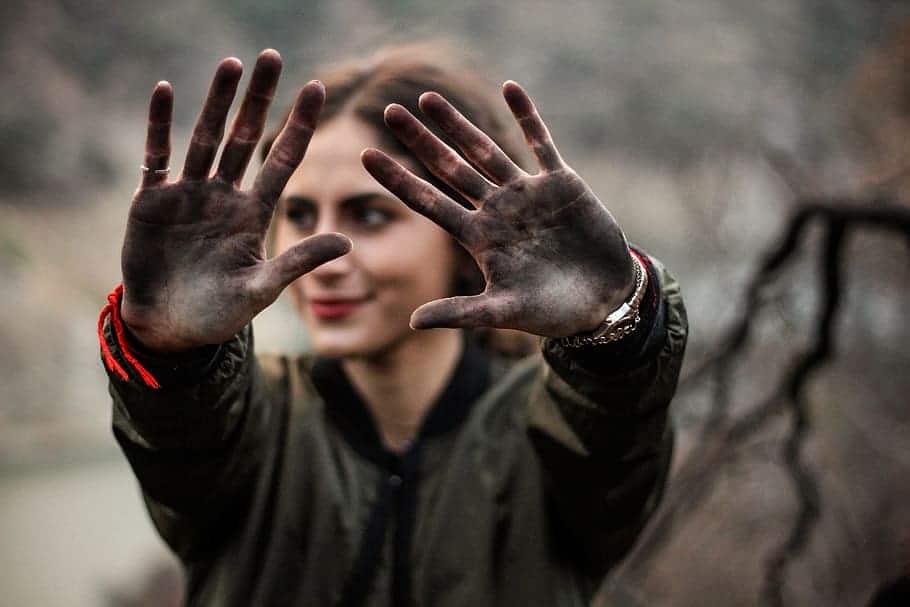 Woman holding open hands in front of her
