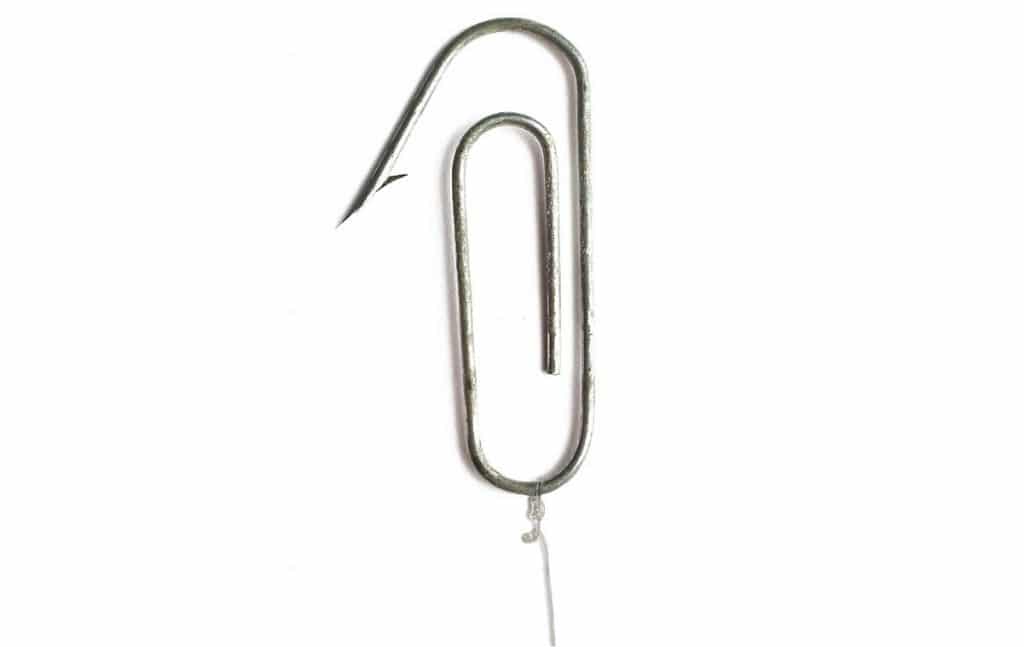 Paper clip shaped into a small improvised fishing hook