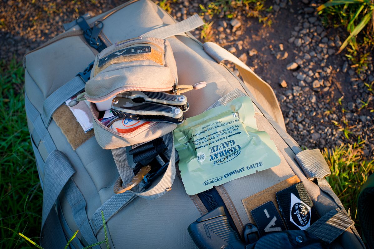 Prepared survival backpack with first aid supplies and outdoor tools